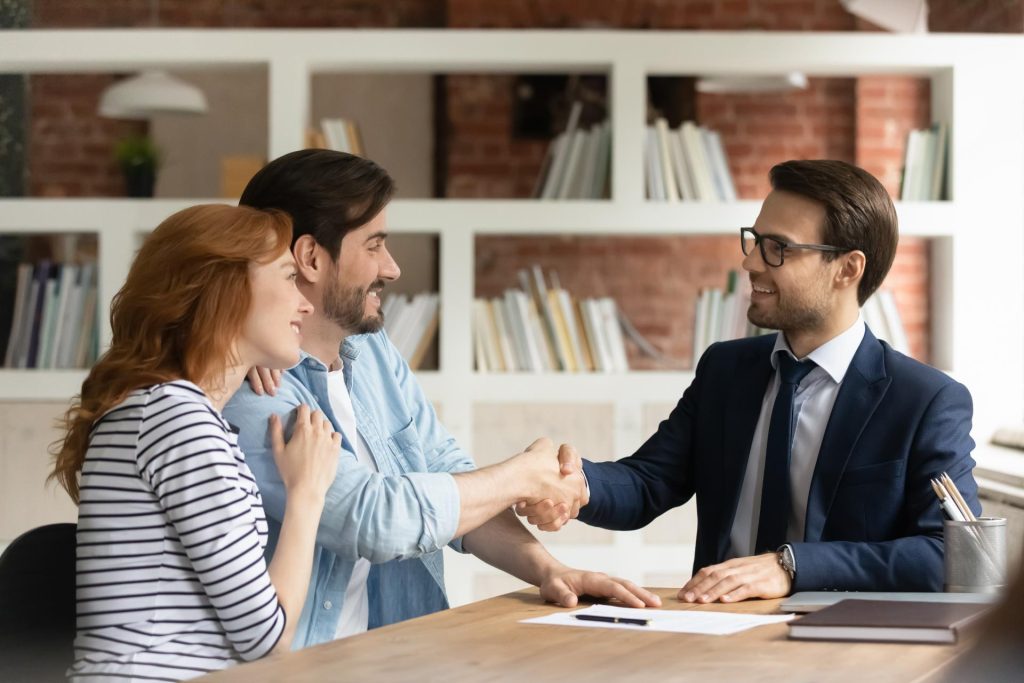 Professional in discussion with a couple