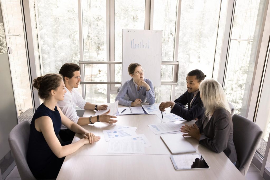 Group of professionals working around the table